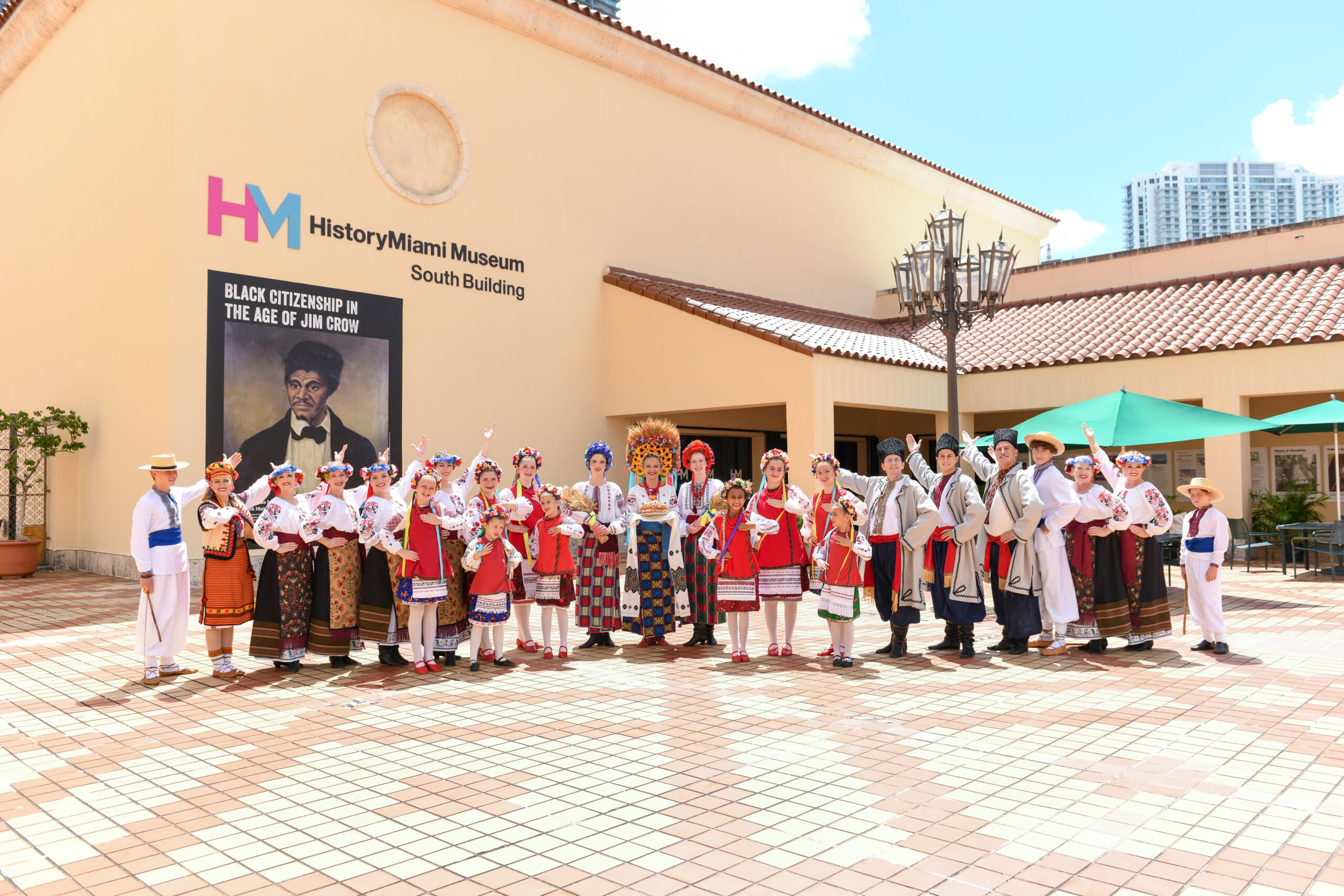 The Ukrainian Dancers of Miami pose in front of the Museum of Miami building.