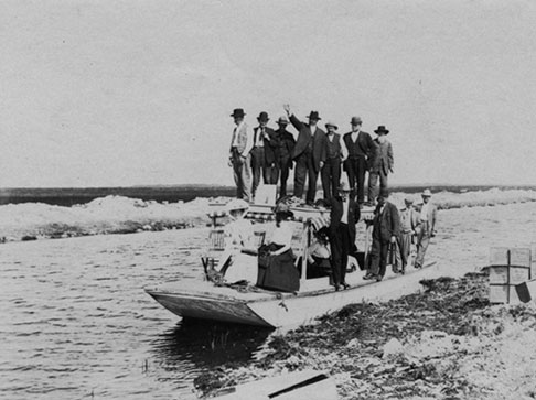 Everglade Land Sales Company salesmen show the Everglades and reclaimed land to prospective buyers. ca. 1911. 1976-051-127