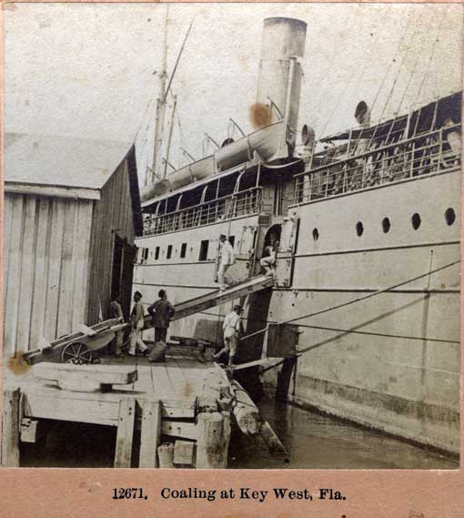 Coaling at Key West, Fla. Littleton, N.H. : B. W. Kilburn, c1898. Image number 2007-440-1
