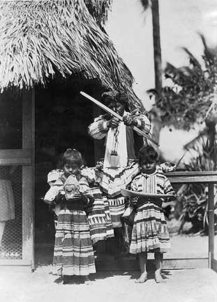 Indian villages in Miami (Musa Isle and Coppinger's) featured alligator wrestling, glimpses of everyday life, and souvenirs. March 4, 1924. Photo by Claude Matlack. 93-30.