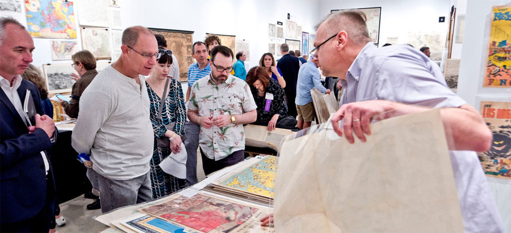 people looking at maps