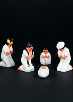 Tourist items featuring the guayabera. Circa 2012. Tourist shops in Merida sell a variety of merchandise featuring the guayabera. These souvenirs include banks, ashtrays, tic-tac-toe games, nativity scenes, toys and other items. Collection of Museum of Miami. Tourist items featuring the guayabera. Circa 2012. Tourist shops in Merida sell a variety of merchandise featuring the guayabera. These souvenirs include banks, ashtrays, tic-tac-toe games, nativity scenes, toys and other items. Collection of Museum of Miami.