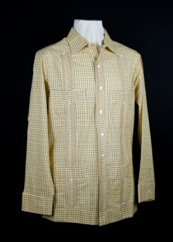 Men’s guayabera. 2012. Cotton. D’Accord. Contemporary guayabera designers are utilizing an array of fabric colors and patterns. Miamibased D’Accord began selling guayaberas in 1981, and current director Rafael Contreras represents the second generation of this family business. This shirt is a prototype for D’Accord’s 2013 spring collection. Collection of Museum of Miami. Gift of D’Accord. Men’s guayabera. 2012. Cotton. D’Accord. Contemporary guayabera designers are utilizing an array of fabric colors and patterns. Miamibased D’Accord began selling guayaberas in 1981, and current director Rafael Contreras represents the second generation of this family business. This shirt is a prototype for D’Accord’s 2013 spring collection. Collection of Museum of Miami. Gift of D’Accord.