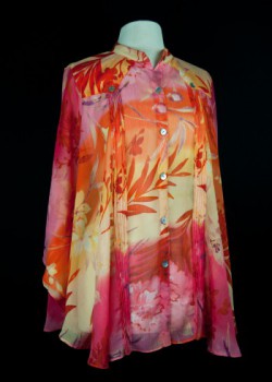 Ladies’ guayabera tunic. 2012. Georgette. The Guayabera Lady. In the past decade, guayabera-inspired pieces for women have entered the scene in earnest. These items include a variety of garment types. Cuban-born Miami designer Berta Bravo, also known as “The Guayabera Lady,” designed this tunic. Bravo’s parents were long-standing guayabera sellers in South Florida. Collection of Museum of Miami. Gift of The Guayabera Lady. Ladies’ guayabera tunic. 2012. Georgette. The Guayabera Lady. In the past decade, guayabera-inspired pieces for women have entered the scene in earnest. These items include a variety of garment types. Cuban-born Miami designer Berta Bravo, also known as “The Guayabera Lady,” designed this tunic. Bravo’s parents were long-standing guayabera sellers in South Florida. Collection of Museum of Miami. Gift of The Guayabera Lady.