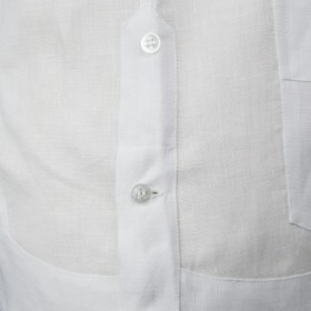 The guayabera’s design includes side vents.